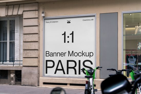 Urban street-level banner mockup on store front, ideal for presenting outdoor advertising designs to clients or portfolio, realistic city setting.